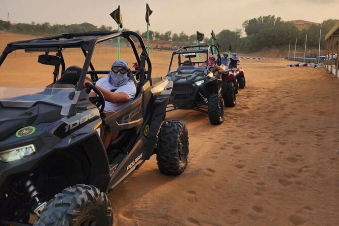 1 Hour Private Self Drive Dune Buggy and Sand boarding in Dubai - Polaris RZR dune driving in Dubai’s red sand