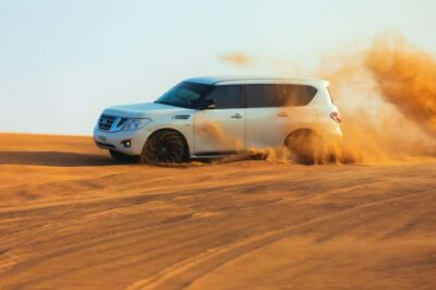 Abu Dhabi: Desert Safari, Quad Bike, Camels & Sandboarding - Pickup and the ride to Al Khatim: comfort first, then chaos