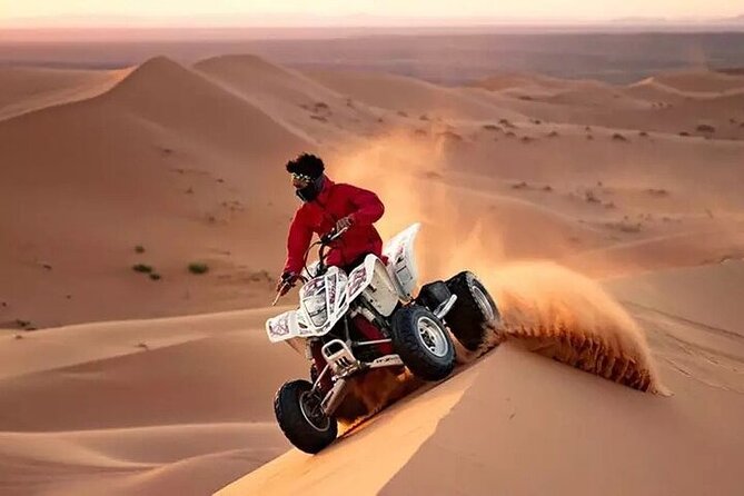 Adventurous Red Dune Desert Safari Deal with Quad Bike,Shows &BBQ - Sunset photo time: the part people remember