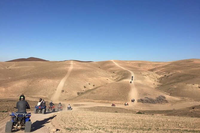Agafay desert Family Package: Quad Bike & Camel Ride, Dinner Show - Dinner Under the Tent: Moroccan Classics and Evening Entertainment