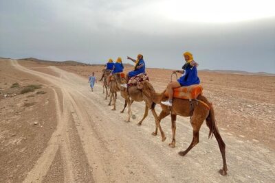Agafay Desert: Quad Camel Experience and Dinner Show - Dromedary ride at sunset: slower travel that actually feels different