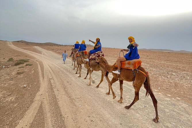 Agafay Desert: Quad Camel Experience and Dinner Show - Dromedary ride at sunset: slower travel that actually feels different