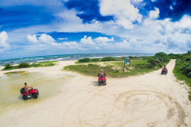 ATV Seashore + Cenote Combo: Mezcalitos & Mayan Cenote Experience - Playa Uvas beach club: lunch, snorkeling gear, and the rocky-entry reality