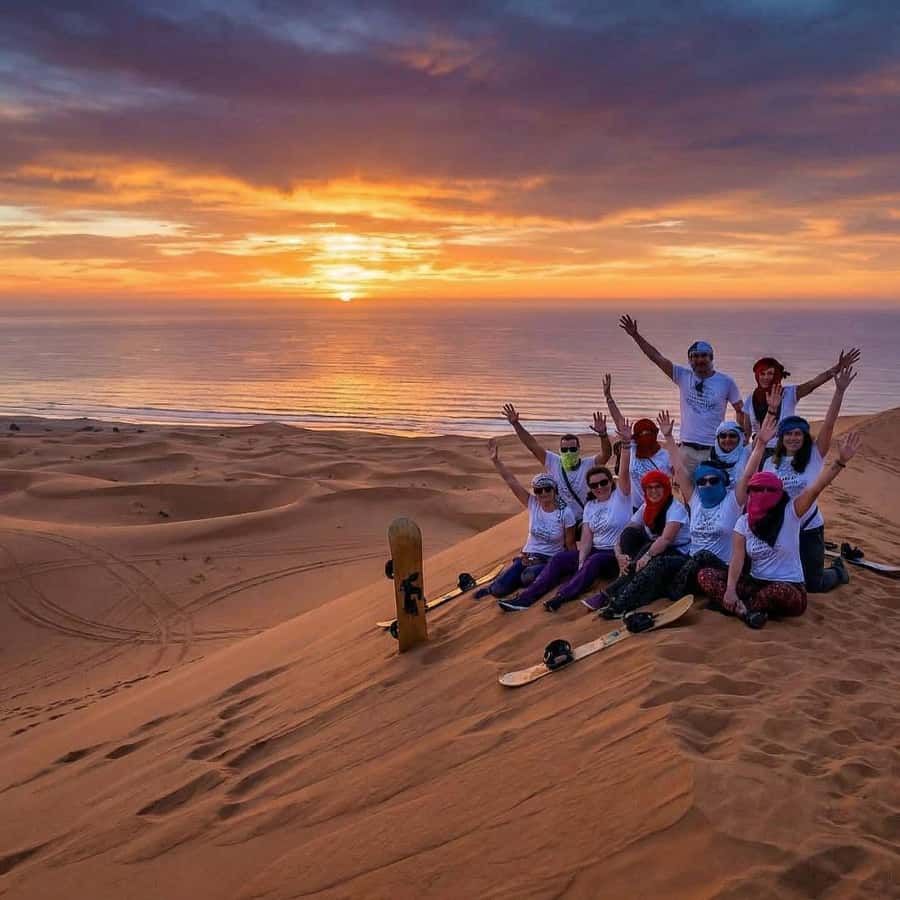Best Agadir Desert Adventure: Quad Camel Sandboarding & BBQ - Timlalin Dunes sandboarding: where the Atlantic steals the show