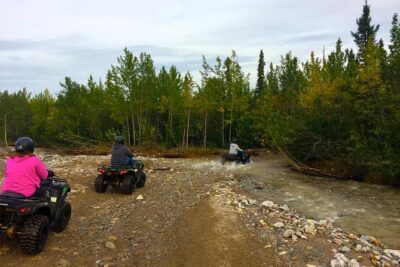 Classic ATV Adventure with Back Country Dining - Picking up gear: helmet, goggles, gloves, and rain readiness
