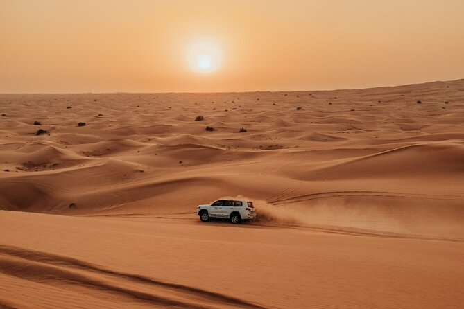 Combo:Deluxe Desert Safari with dinner + ATV self-drive/Quad Bike - Dinner and Shows: Open-Fire BBQ Plus Tanoura, Fire, and Belly Dancing