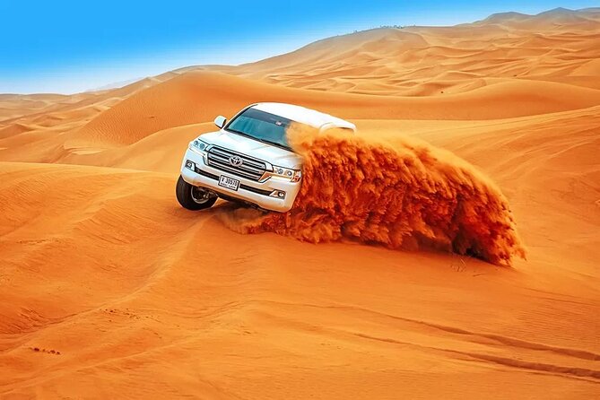 Desert Safari BBQ Dinner, Live Shows, ATV Bikes, Sandboarding - Belly Dance, Tanoura, and Fire Show: Evening Entertainment That Moves