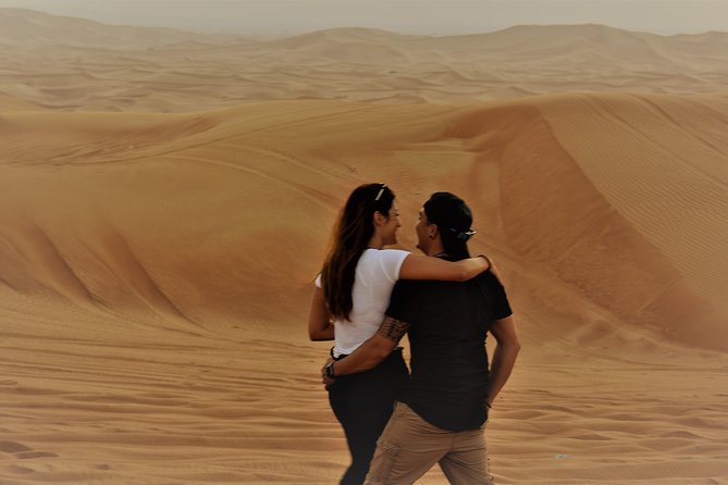 Desert Safari Tour, Quad Bike with BBQ Dinner & Show from Dubai - Sandboarding in the Dunes: Included Adrenaline Time