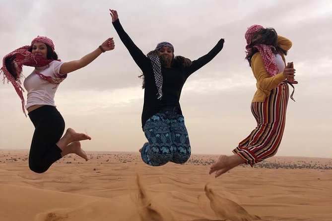 Desert Safari Tour with 30 Minutes Quad bike Ride - Desert Camp Extras: Camel Ride, Henna, Sheesha, and Sand Boarding