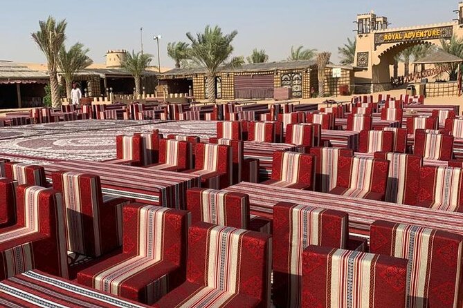 Desert Safari W/BBQ Dinner, Quad Bike, Camel Ride, & Sandboarding - Royal Adventure Camp Welcome: Coffee, Dates, Henna, and Sunset Photos