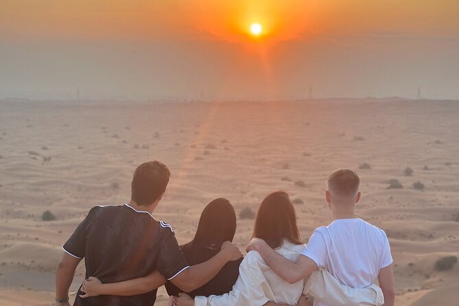 Desert Safari With BBQ Dinner, Quad Bike & Camel Ride from Dubai - Camel Ride, Falcon Poses, and the Desert Photo Stops