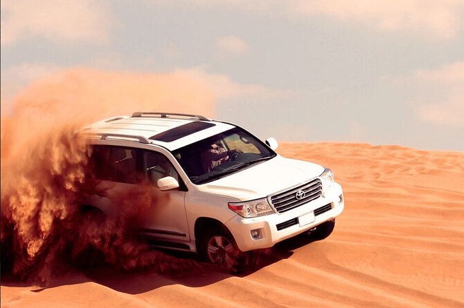 Desert Safari with Quad Bike, 4x4 Dune Bashing and Camel Ride - Sand Boarding and the Sunset Photo Stop