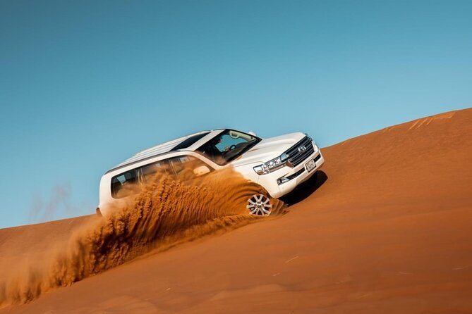 Desert Thrills: Evening Safari with Quad Bike & Camp Activities - Dune Bashing in a 4x4: Fun, Fast, and Not for Delicate Stomachs