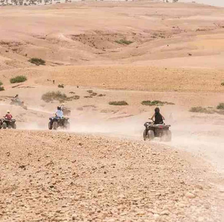 Dinner show in agafay Desert 1h quad bike & 20 min camels - Candle-Lit Moroccan Dinner Plus Berber Music and Fire