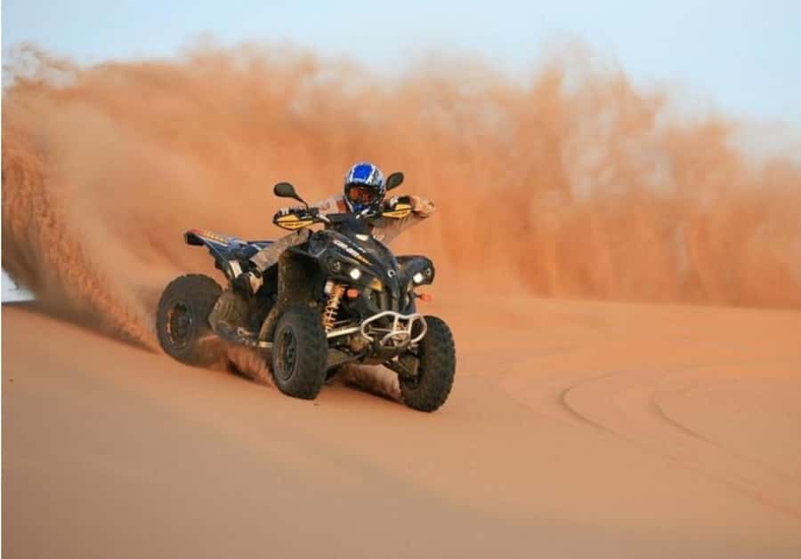 Doha:ATV,Quad or Buggy Dune Bashing,CamelRide & Sandboarding - Sandboarding at Inland Sea: Quick, Fun, and a Bit Physically Real