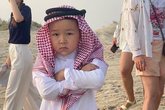 Doha Desert Safari Camel Ride Dune Bashing and ATV Bike - Camel ride across the dunes: a calm counterbalance