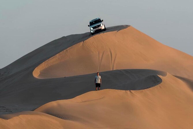 Doha: Desert Safari | Camel ride | Sand-boarding | Quad Biking - Sand-boarding: Slide Down the Dunes Without Overthinking It