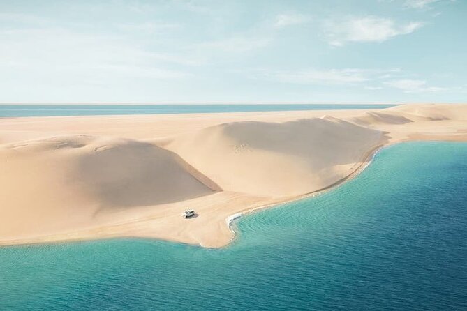 Doha: Desert Safari: Dune Bashing, Quad Bikes & Camel Rides - Stop 1: Doha pickup and the warm-up head out