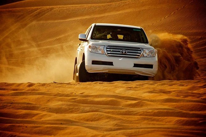 Doha :Half Day Desert Safari | Camel Riding | ATV | Sand Surfing - Sealine Beach: tea, a break, and a quick camel add-on