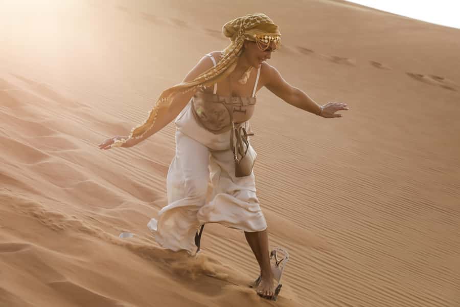 Doha: Half-Day Desert Safari, Quad Bike, Camels & Inland Sea - Sandboarding on a Wooden Board: Short Time, Big Momentum