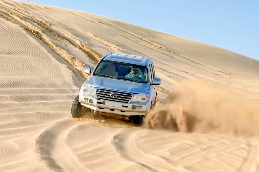 Doha: Half-Day Desert Safari, Quad Bike, Camels & Inland Sea - Inland Sea Visit: Where the Desert Turns Calm (and Photogenic)