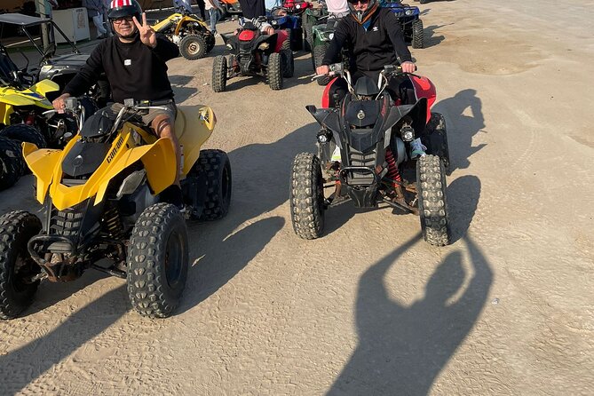Doha Qatar ATV Quad Bike Buggy Dune Bashing and Camel Ride - Dune bashing at Sealine Beach plus sandboarding (about 40 minutes)