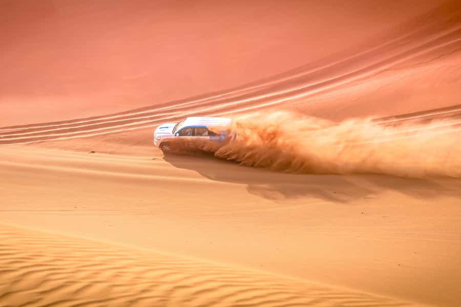 Doha: Safari, ATV, Camels, Sandboarding and Inland Sea Tour - Sealine Beach Photo Stop and Camel Time: A Calm Reset Before the Chaos