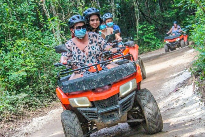 Drive an Atv shared, swim in a Cenote and ziplines in the Cancun - Cenote Swim: Sacred Feeling Meets Time Reality