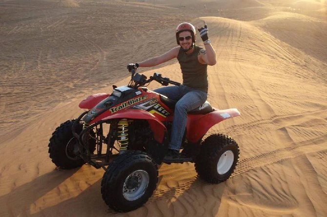 Dubai 30 Mins Quad Bike Desert Drive & Safari - Morning - Camel ride and sandboarding: included steps that round out the desert feeling