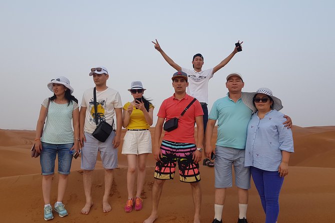 Dubai 4x4 Desert Safari, Quad Bike, Camel Ride & BBQ Dinner - Sandboarding and the Sunset Picture Stop: The Calm Between Thrills