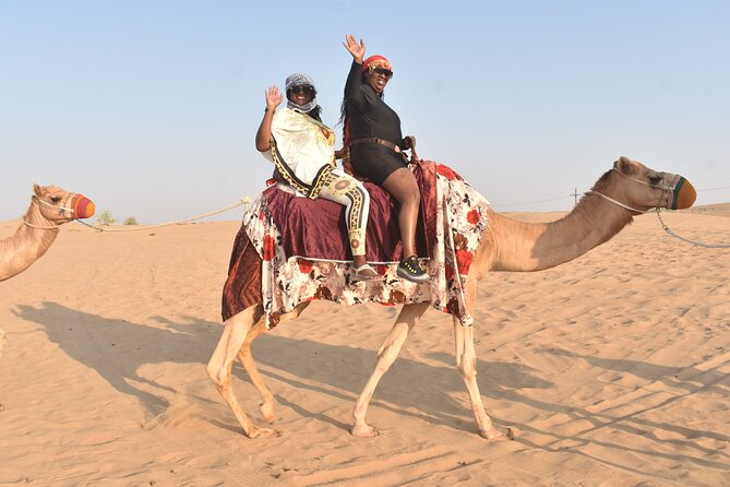 Dubai: 60Minute Self-Drive ATV Quadbike, Camel Ride, Sand Surfing - Camel ride and sand surfing: the perfect change of pace