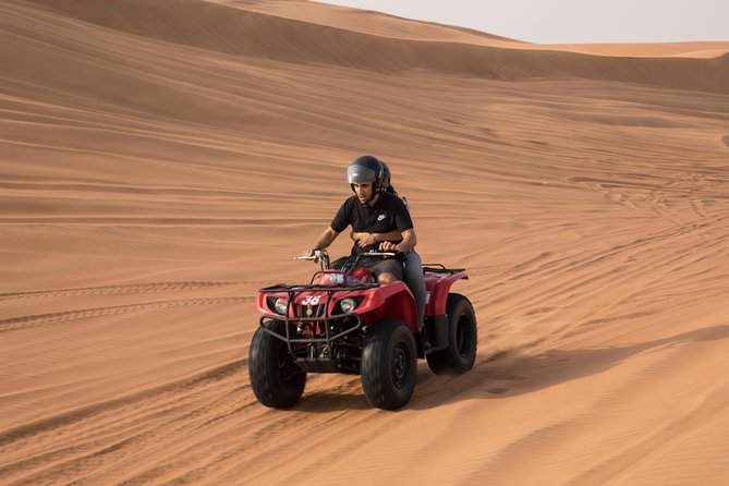 Dubai: Adventure Quad Bike Safari, Camel Ride & Refreshments - Sandboarding and the camel ride: two ways to see the same dunes