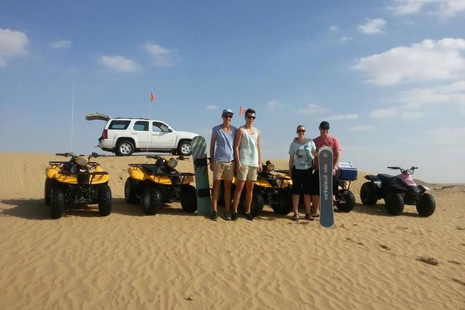 Dubai Desert Morning Tour in 4WD Vehicle: Camel Ride, Quad Bike Tour, Sandboarding, and Camel Farm - Quad Bike Time: Helmet On, Guide Out Front, and Real Dune Riding