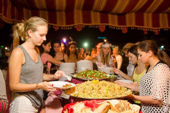 Dubai Desert Safari Adventure, 60mins ATV, Camel Ride, Shows, BBQ - Sandboarding + camel ride + henna and costumes: culture with training wheels