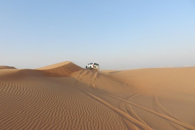Dubai Desert Safari, ATV open desert, Camel ride, Shows & BBQ - Belly dancing, fire show, and Tanoura: the big night finale