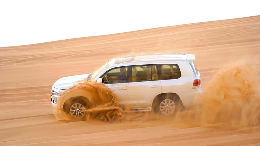Dubai: Desert Safari, Camel Ride, Sandboarding, Quad Bike - Timing and what the day feels like overall
