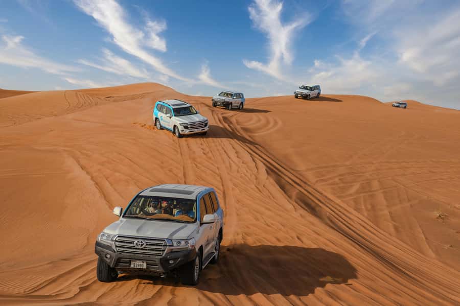 Dubai: Desert Safari, Quad Bike, Camel Ride & Al Khayma Camp - Camel Ride in Open Sand: Views You Can’t Replace