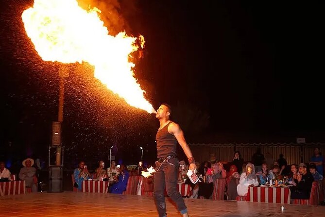 Dubai Desert Safari: Quad Bike, Camel Ride and BBQ Dinner - Bedouin camp time: food, sheesha, and small extras