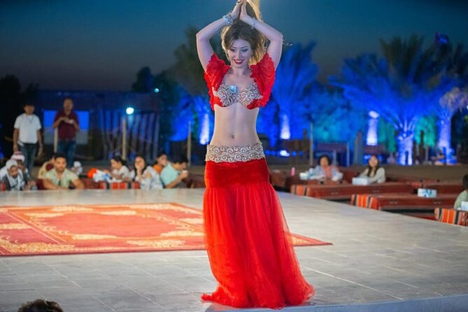 Dubai Desert Safari: Quad Bike, Camel Ride and BBQ Dinner - The dinner show: belly dance, Tanoura, and fire under the stars