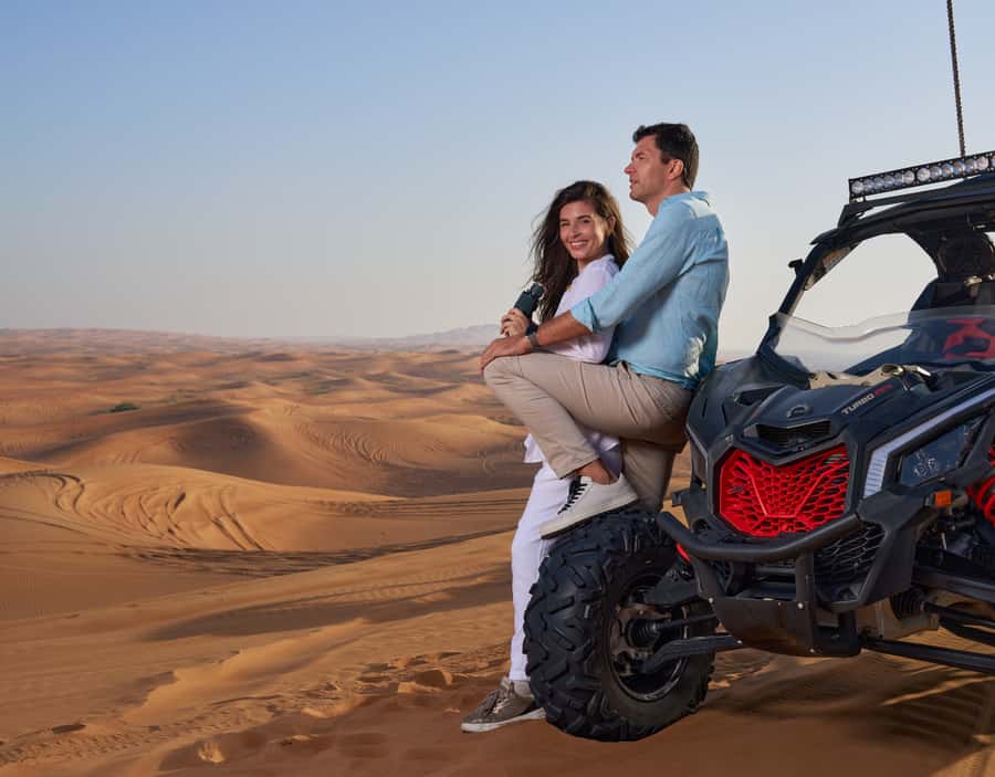 Dubai: Desert Safari, Quad Bike & Premium Camp Experience - Sandboarding and camel rides: classic desert flavor beyond the adrenaline