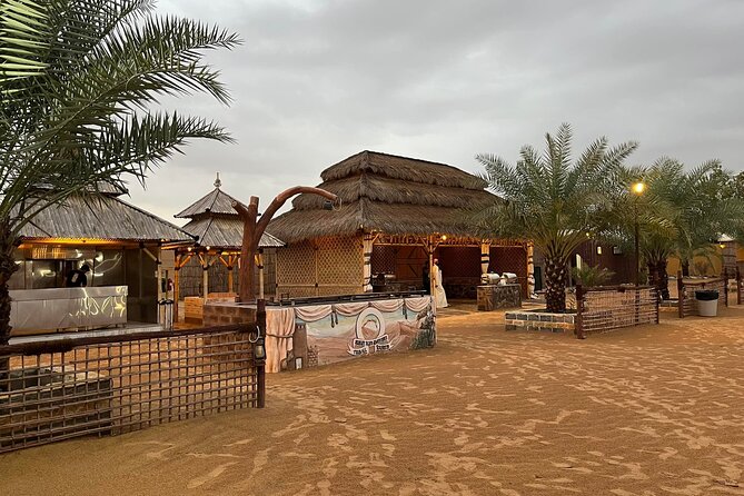 Dubai Desert Safari Sharing with Quad, Shows, Camel and Dinner - Dune Bashing, Sandboarding, and the Sunset Photo Stop