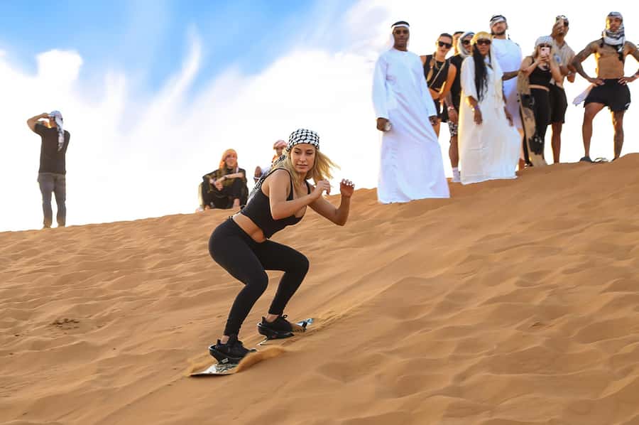 Dubai: Desert Safari with BBQ Dinner & Quad Biking Options - Sandboarding and camel riding: two different desert styles