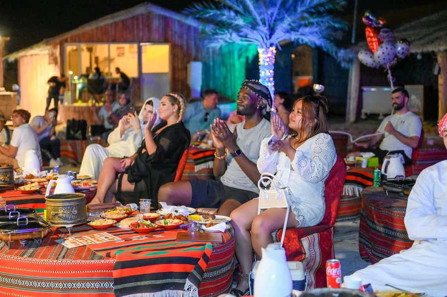 Dubai: Desert Safari with BBQ Dinner & Quad Biking Options - Camp time at Al Aweer: BBQ, coffee, and performances