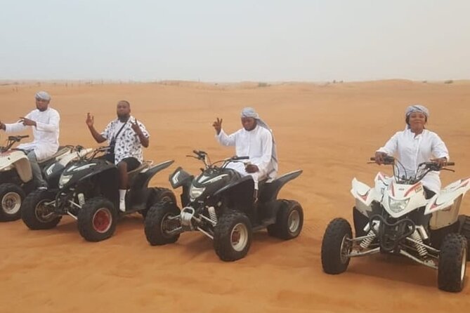 Dubai Desert Safari with Quad Bike, Camel Ride, Dinner and Shows - Camel Ride, Sandboarding, Henna, and Traditional Dress Photos