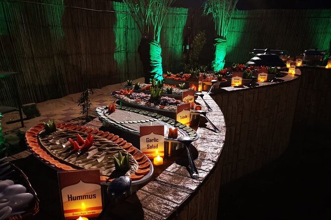 Dubai Desert Safari with Quad Bike, Camel Ride, Dinner and Shows - Belly Dance, Tanura, and Fire Shows: The Night’s Main Event
