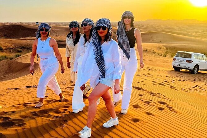 Dubai Desert Safari with Self Drive Quad Biking & Camel Riding - Sandboarding + Camel Riding: Where the Desert Turns Playful