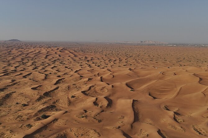 Dubai: Dune Buggy Safari and Camel Ride with Transportation - The Basecamp Break: AC Comfort, Prayer Rooms, and Desert Views