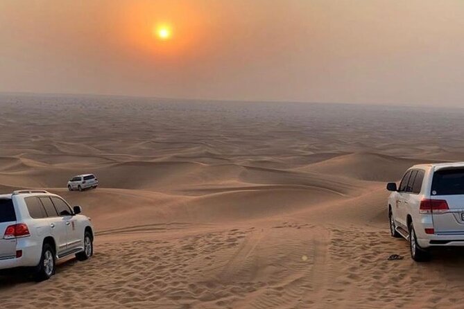 Dubai Dunes Safari With Quad Bike, Camel Ride, BBQ Dinner & Live Shows - Dinner under the stars: international buffet BBQ plus three live shows