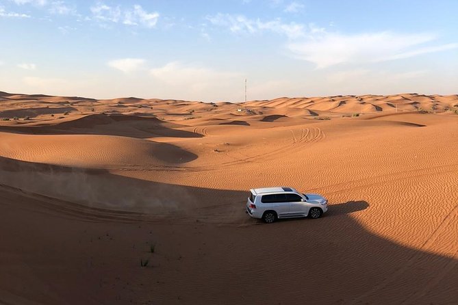 Dubai Evening Desert Safari with ATV Quad Bike & Dinner - Camel Ride at the Camp: Culture You Can See Close Up
