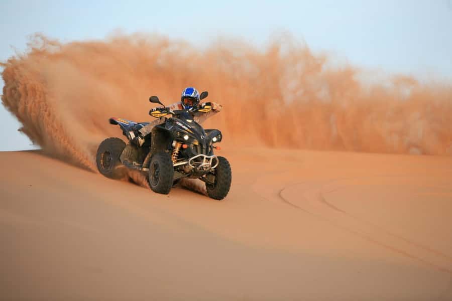 Dubai: Evening Tour with Quad Biking, Camel Ride, and BBQ - Desert Rest Stop: Gear Up, Use the Facilities, Then Head for Dune Time